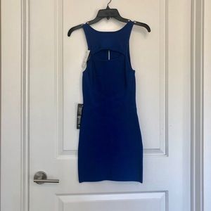 BEBE peekaboo crew neck bandage dress